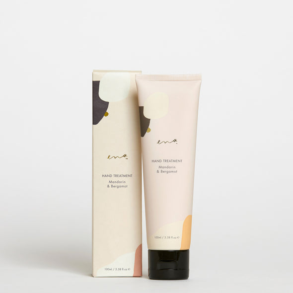 hand treatment by ena products in Mandarin & Bergamot in a beige container in 100ml